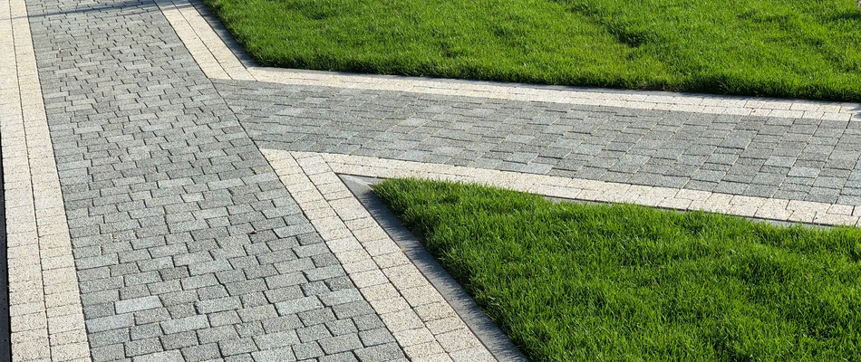 A grey paver walkway recently installed by our team in Yonkers, NY.