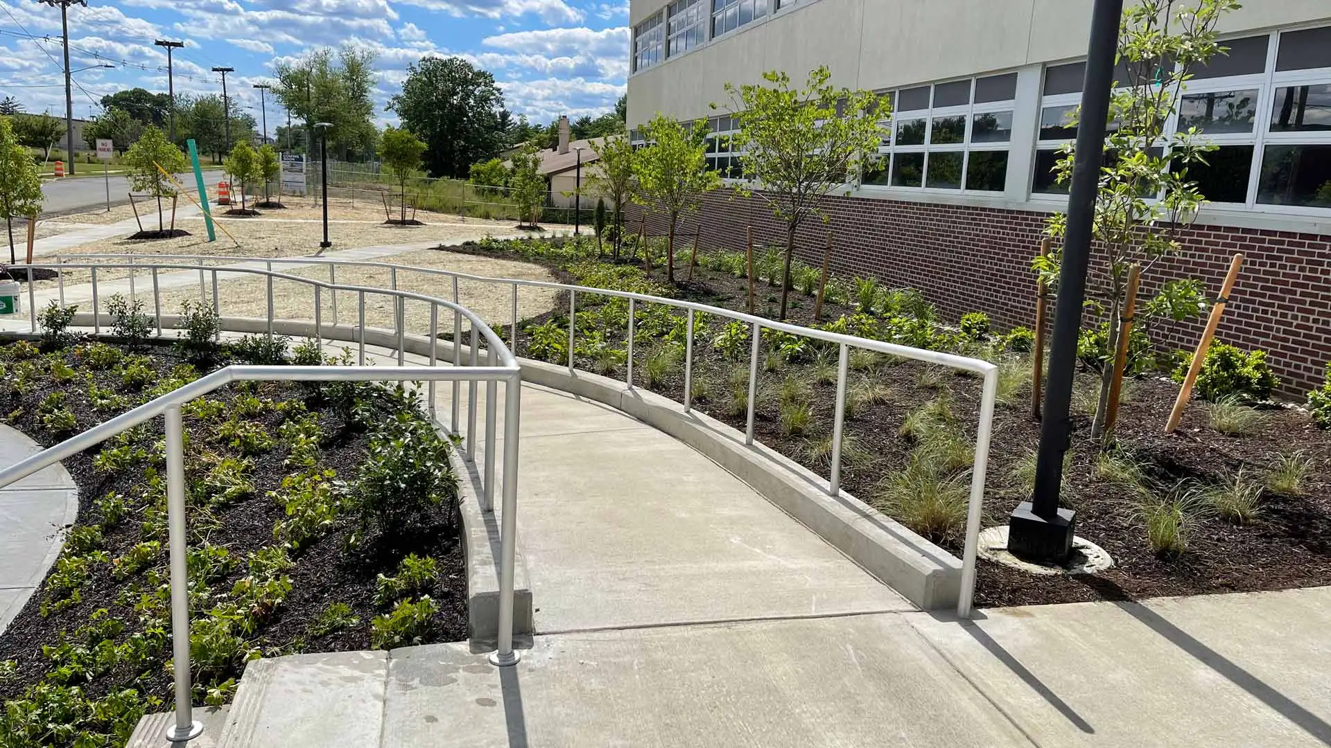 A building with its landscape maintained by professionals in Manhattan, NY.