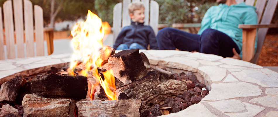 A father and son enjoying their recently built fire pit in Edison, NJ.