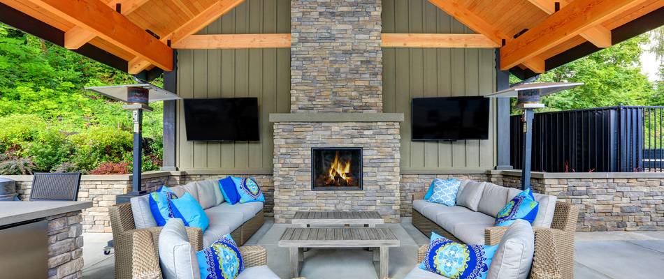A custom build stone fireplace under a pavilion on our client's property in Englewood Cliffs, NJ.