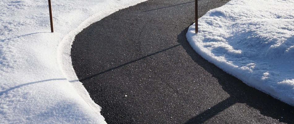 Snow removed from walkway for a commercial property in Allendale, NJ.