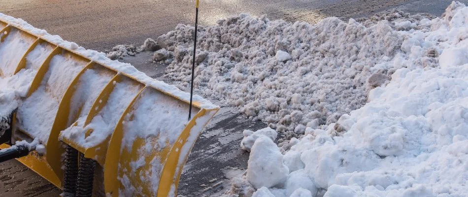 Snowy road in Tarrytown, NY, being plowed.