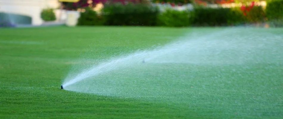 A sprinkler system watering a lawn in New Rochelle, NY.
