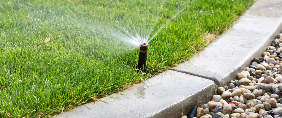 Sprinkler system watering lawn in Alpine, NJ.