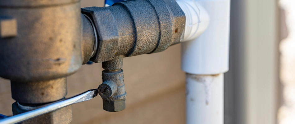 Startup service being performed on an irrigation system in Edgewater, NJ.