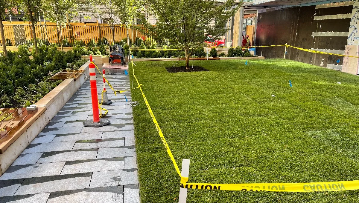 Home in Dobbs Ferry, NY with a patterned paver driveway.